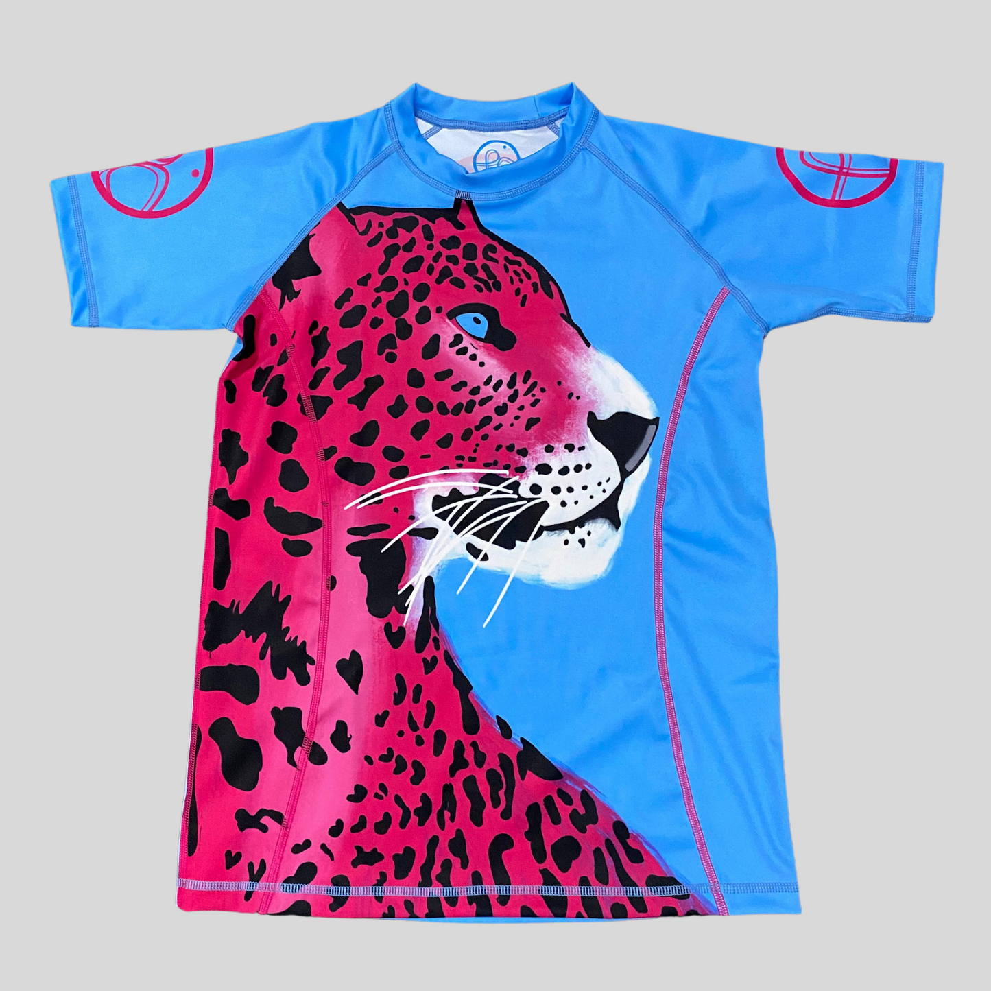 Blue rashguard featuring a sleek jaguar pattern, tailored for grapplers."