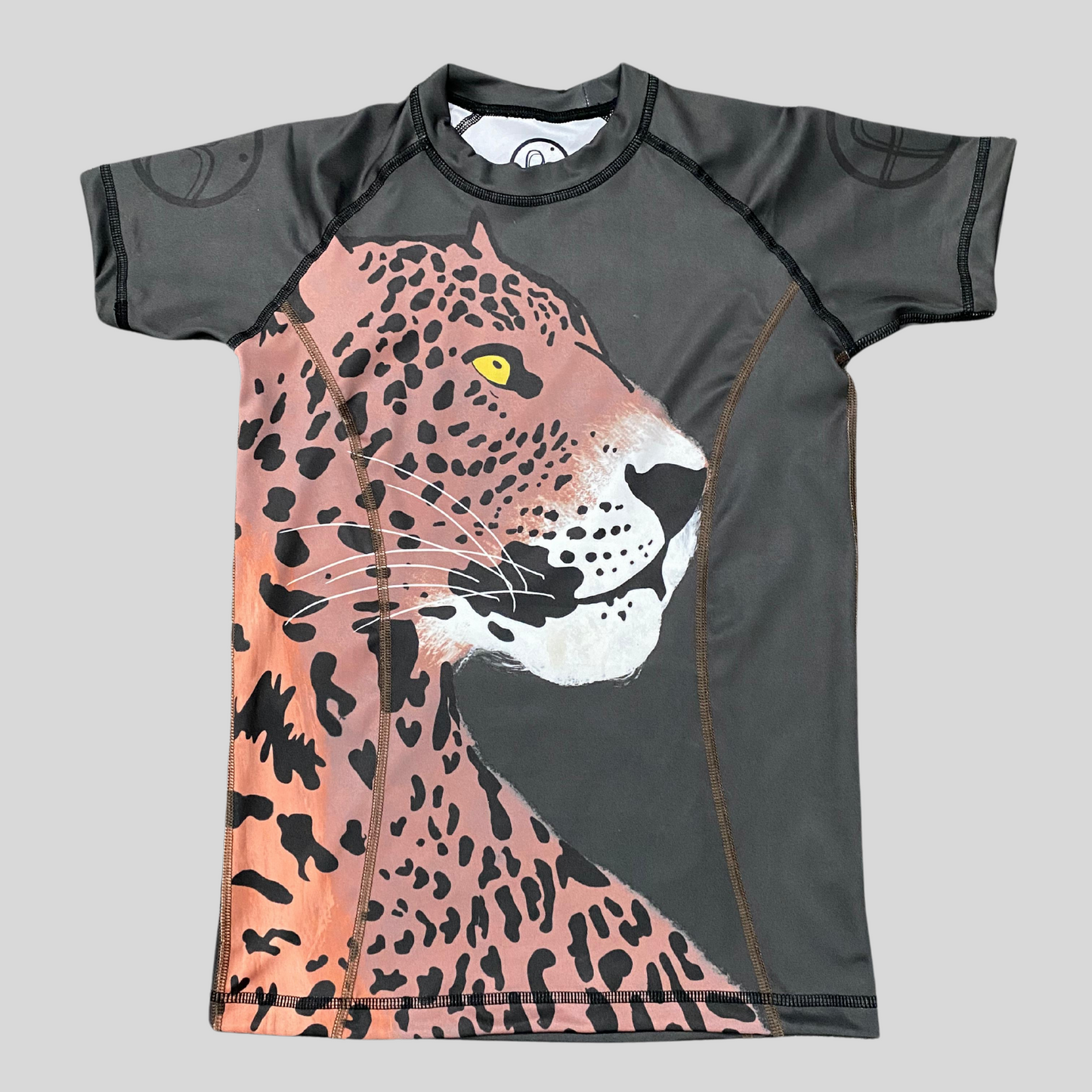Charcoal gray rashguard featuring a sleek jaguar pattern, tailored for grapplers."