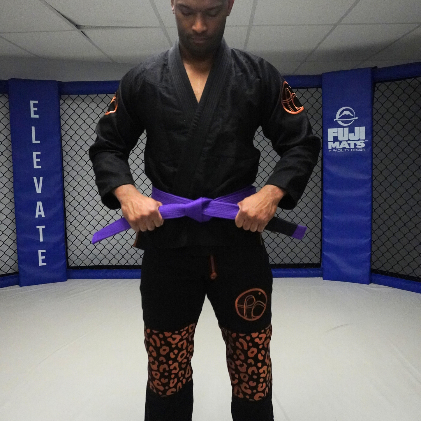 full front view of paower and co jaguard gi black with brown pattern