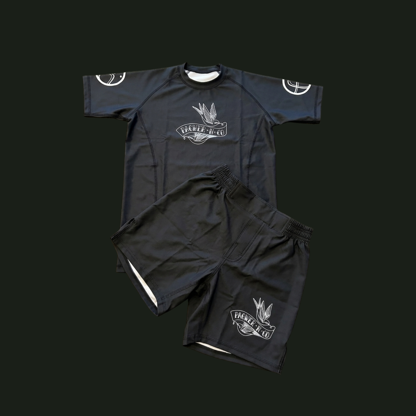 Black athletic outfit with reflective elements on a black background