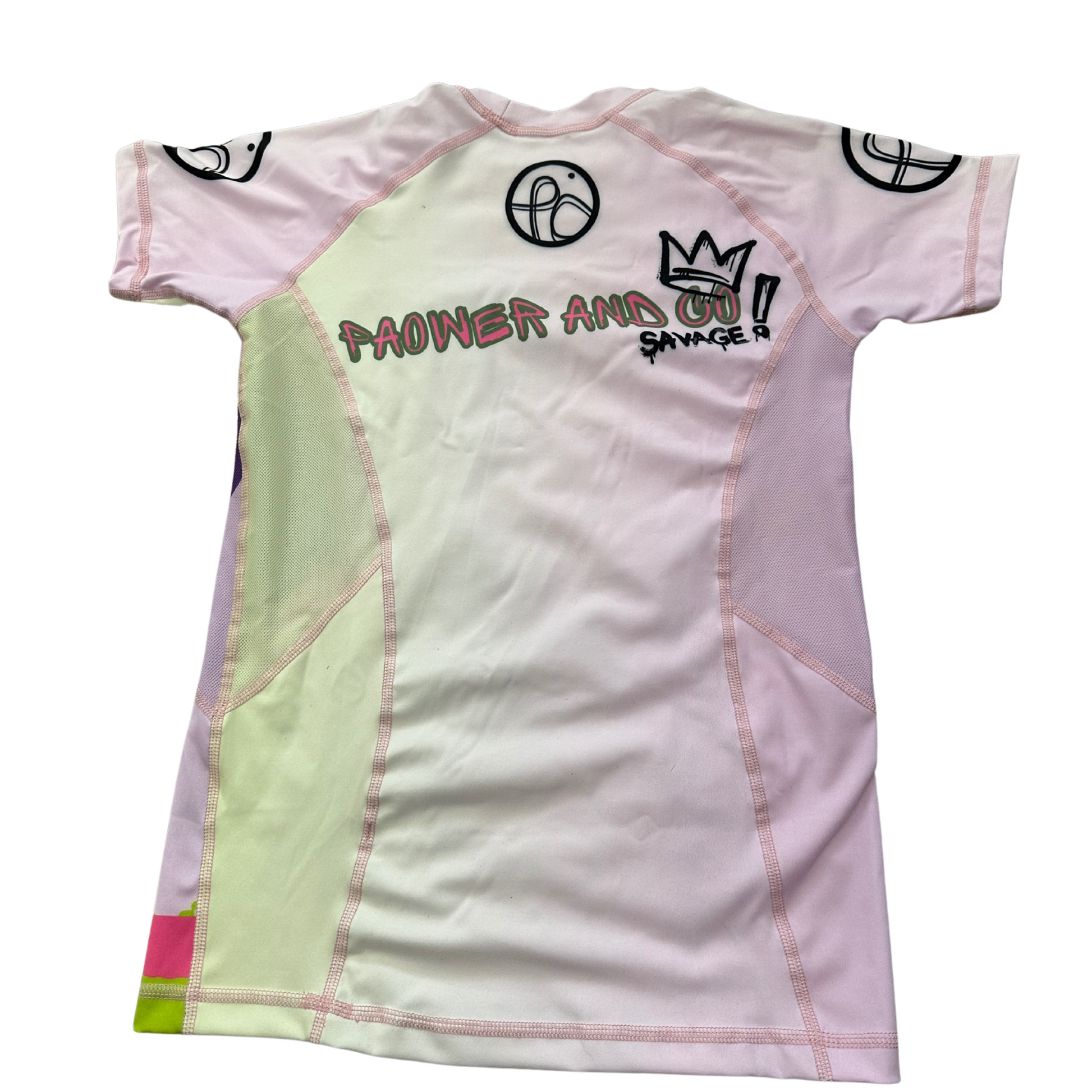 back view of paower and cos queen P rashguard showing pink and yellow colors as well as mesh material on the panels