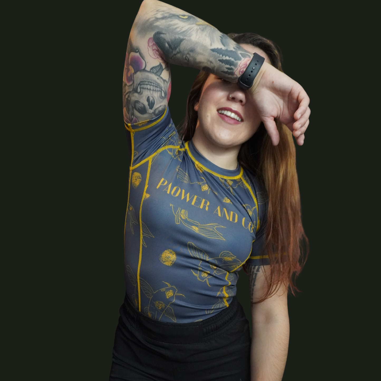 closed up video of female wearing the paower and co KOI rashguard 