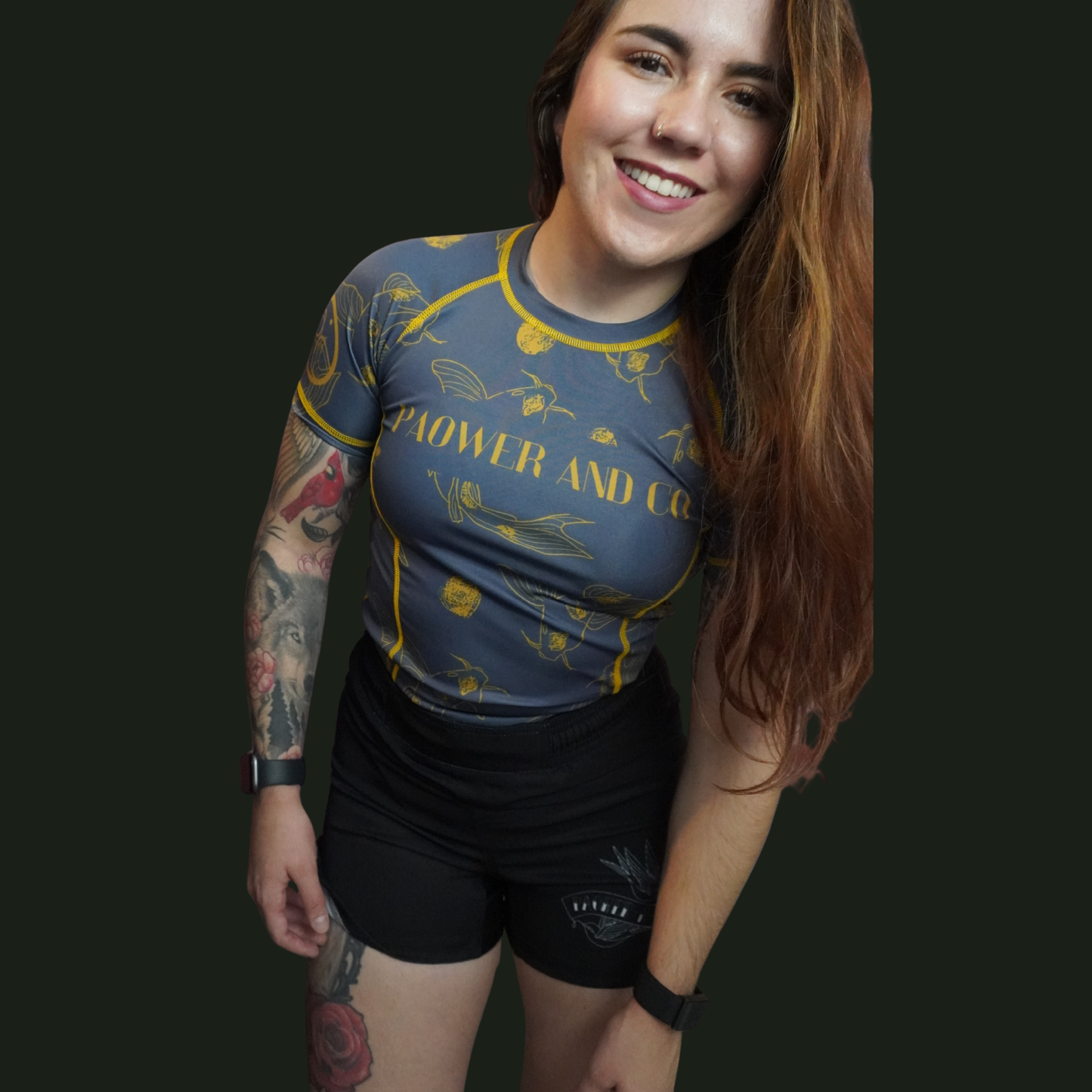 front view of the blue and gold koi rashguard for females 