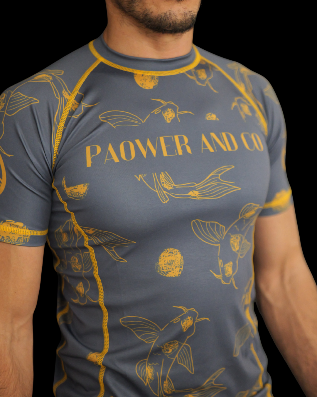 male front view of koi rashguard with details